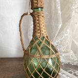 Bottle with rattan weaving