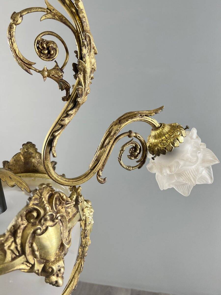 Louis XV style chandelier in bronze and glass, 19th century