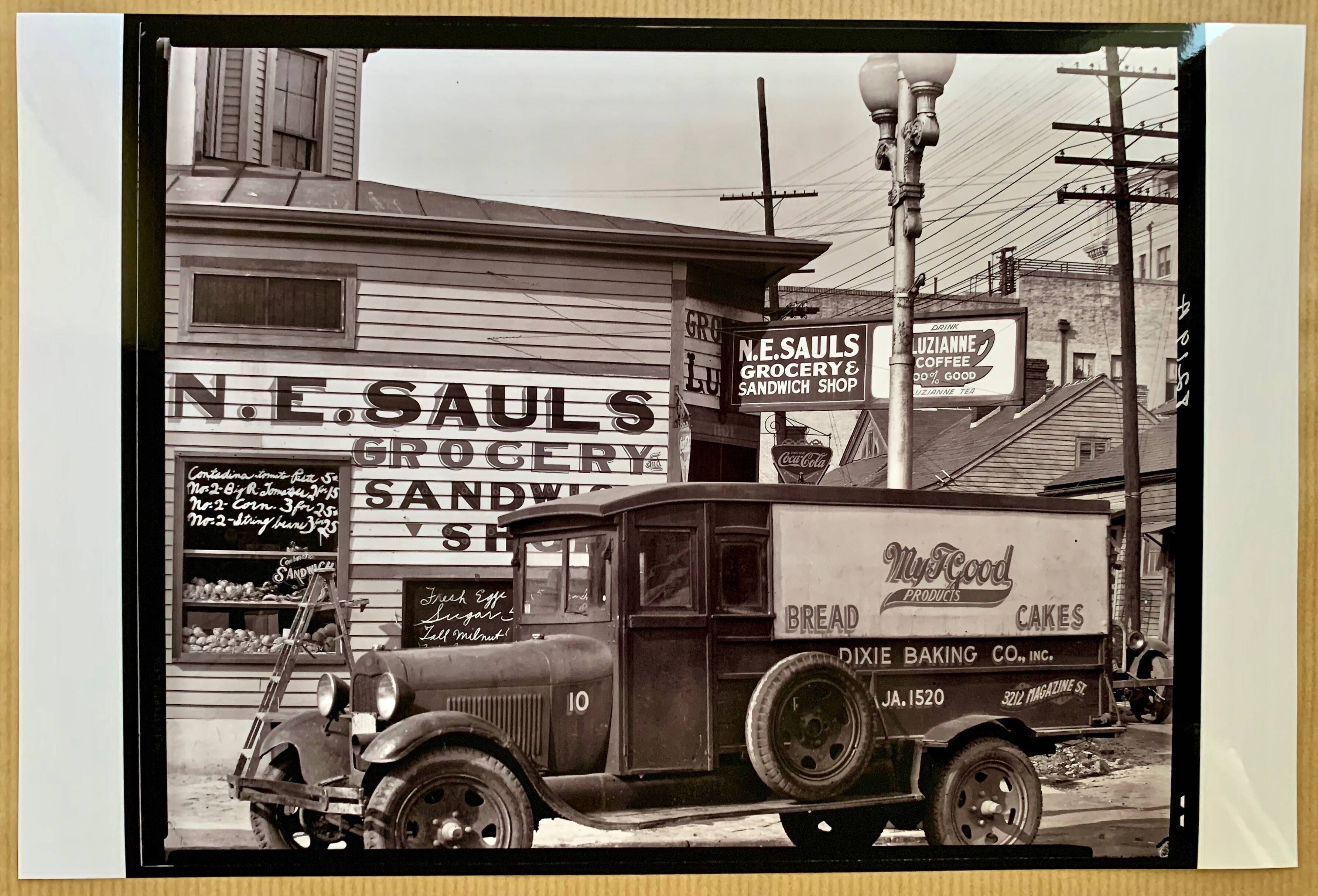 "Street corner in New Orleans, front of the NE Saul' sandwich shop