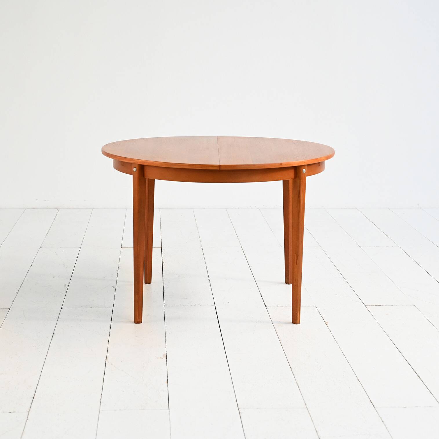 Scandinavian round extendable teak table 1960s