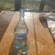 Liquor service consisting of a blue glass decanter and. 3 small antique glasses