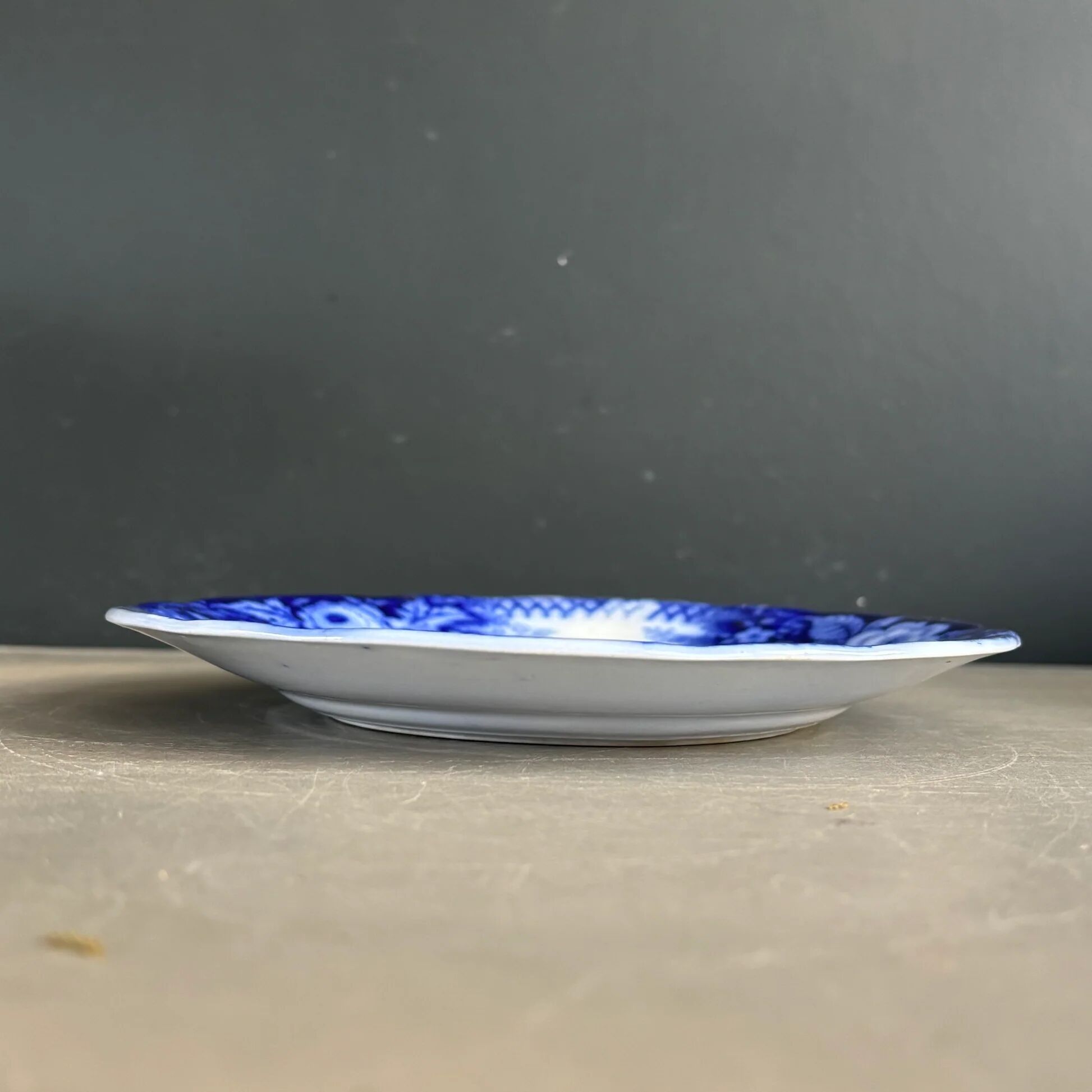 Stack of Sarreguemines plates, jardinière model.