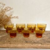 7 small amber glasses