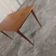 Scandinavian teak table with built-in extension