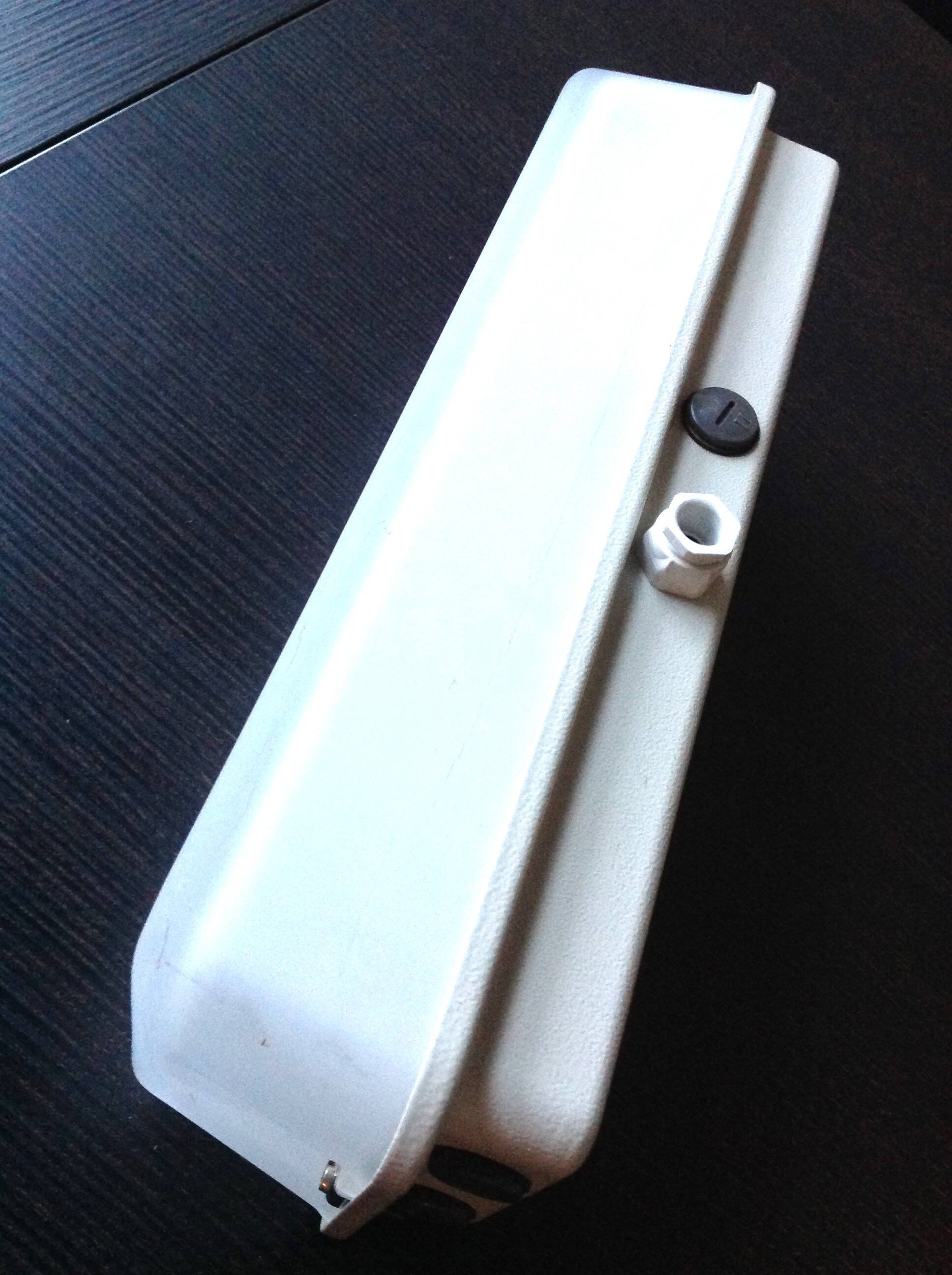 Rectangular porthole wall light in industrial/70s style frosted glass