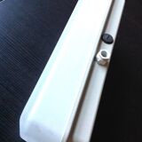 Rectangular porthole wall light in industrial/70s style frosted glass