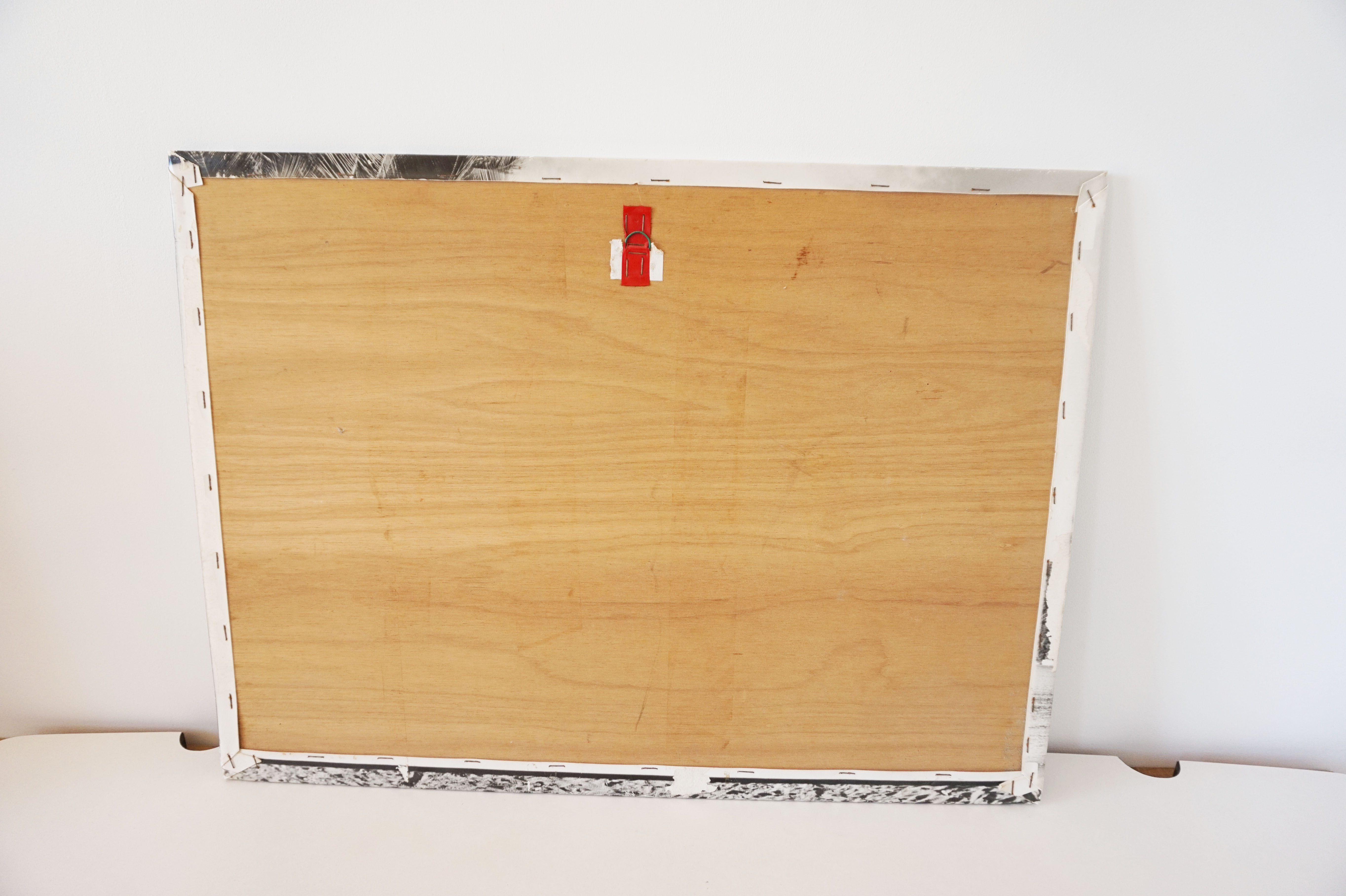 Old photograph on wood panel