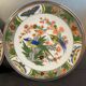 Two Raynaud Limoges plates and Tetard brothers silver.