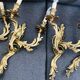 Deux paires d’appliques en bronze