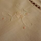 White tablecloth embroidered with lace & days