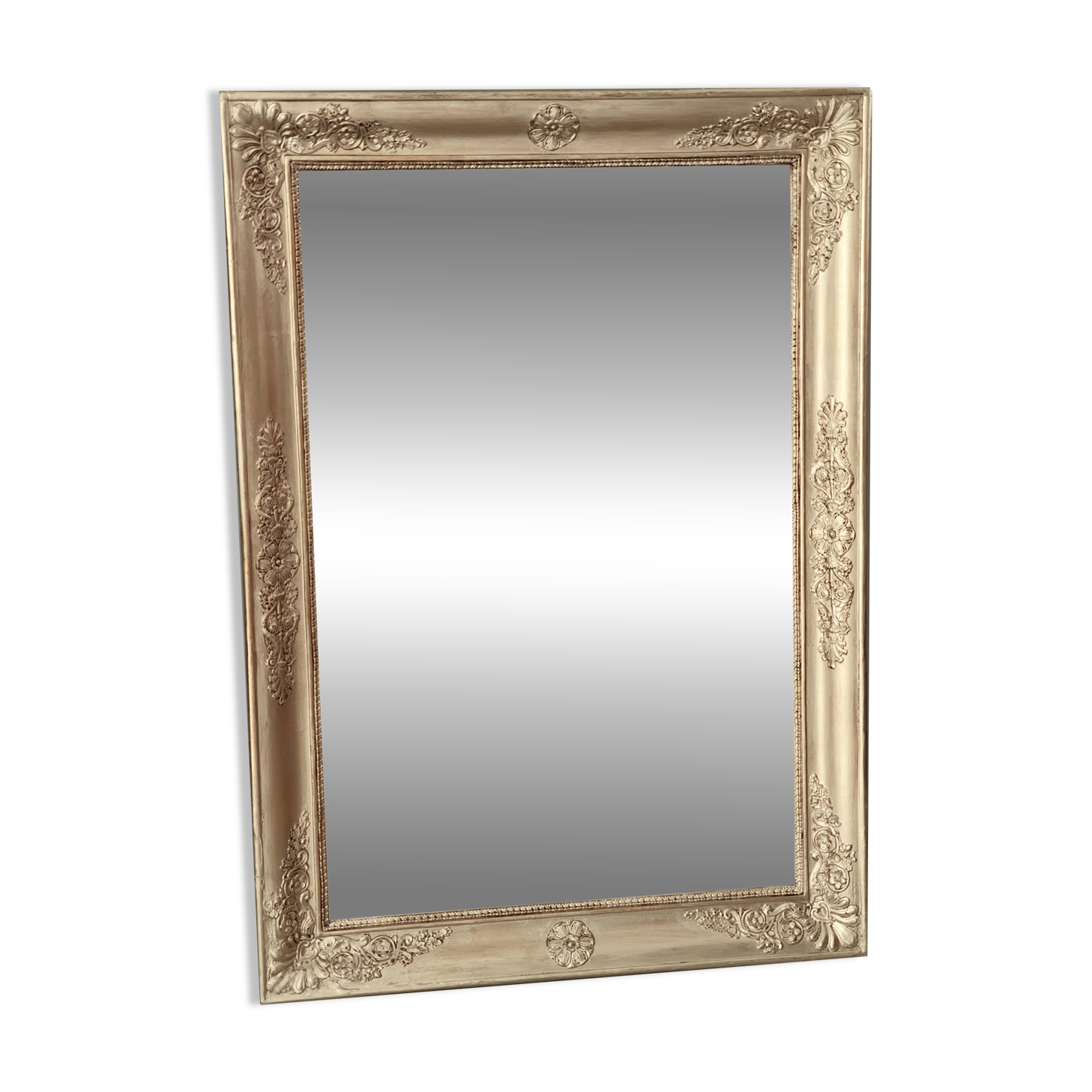 Wood and gilded stucco mirror, 19th century, 115 x 61.5 cm.