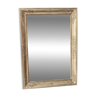 Wood and gilded stucco mirror, 19th century, 115 x 61.5 cm.