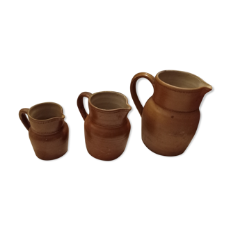 Trio of old sandstone pitchers