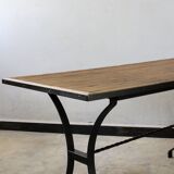 Dining table in rattan and wrought iron similar to Audoux & Minet.