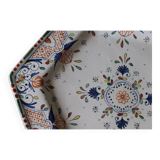 Ancient hexagonal plate in earthenware with polychrome floral decoration.