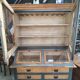 Large two-body grain merchant cabinet made of solid wood.