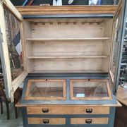 Large two-body grain merchant cabinet made of solid wood.