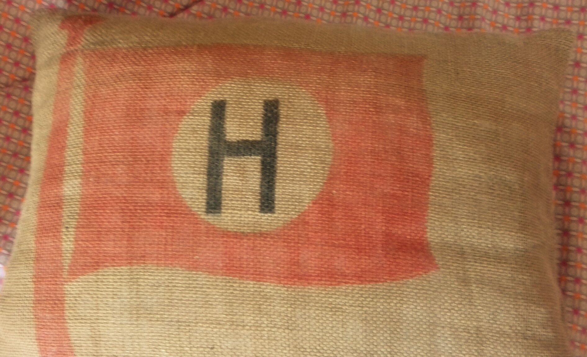 Jute Canvas cushion Red flag Majuscule H in coat of the house