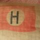Jute Canvas cushion Red flag Majuscule H in coat of the house