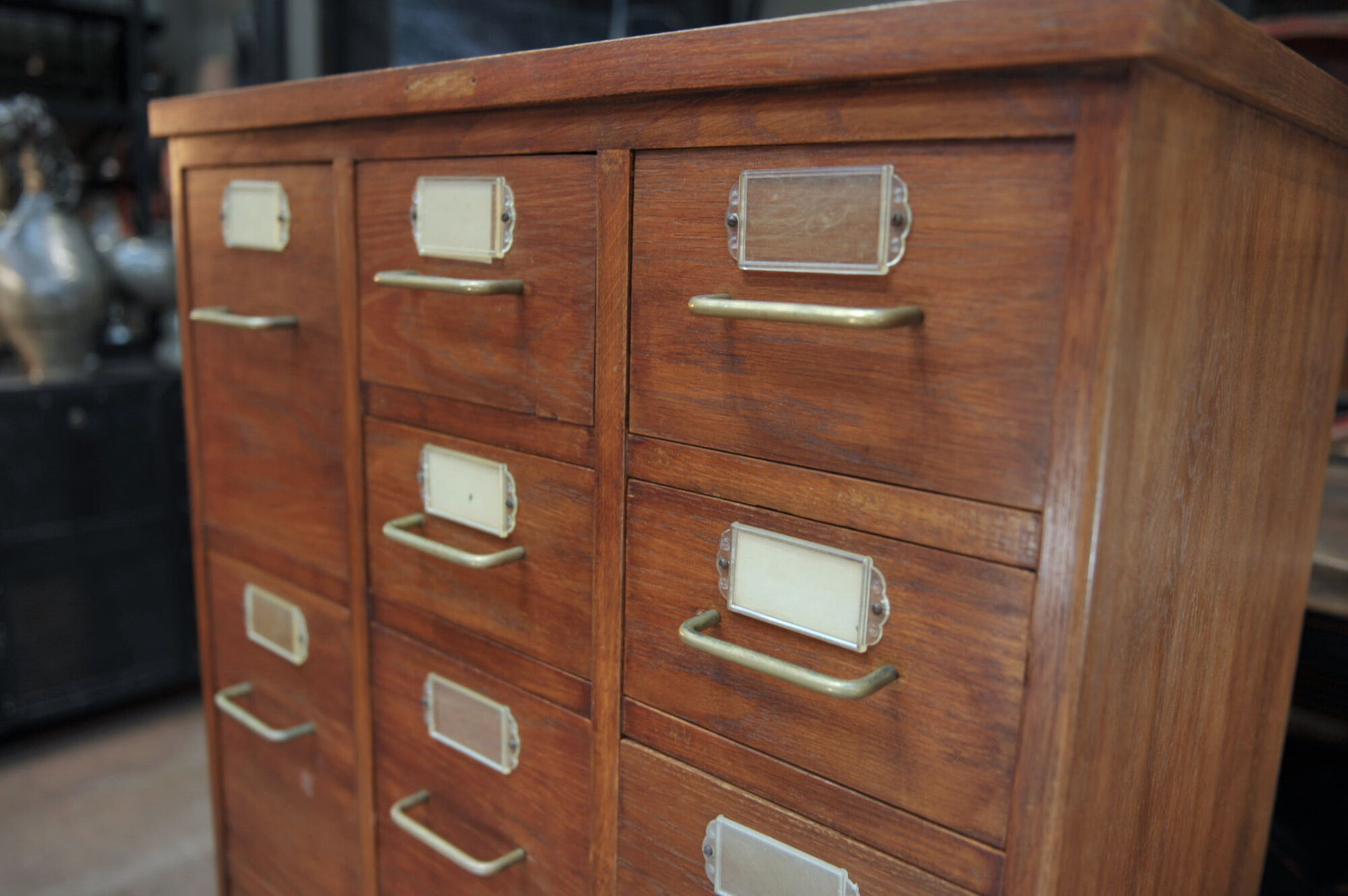 Office furniture has oak drawers 1950 brass handles and label holders