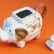 White porcelain teapot decorated with peonies elephant shape