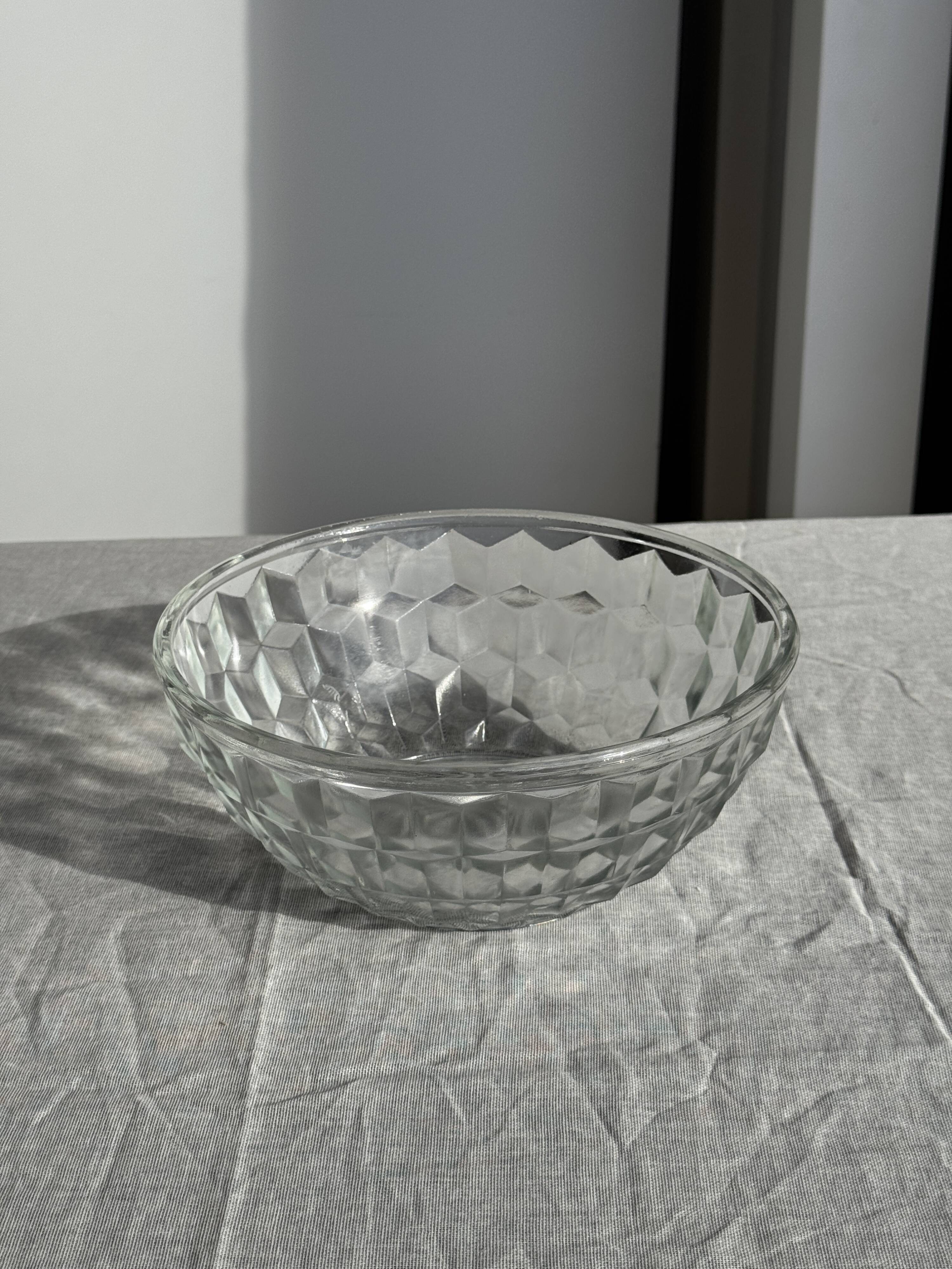 Small vintage glass bowl with a cube pattern.