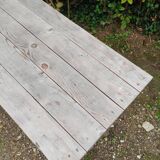 Antique bistro table with iron legs and wooden top