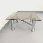 Square Italian vintage Space Age coffee table in smoked glass and metal.