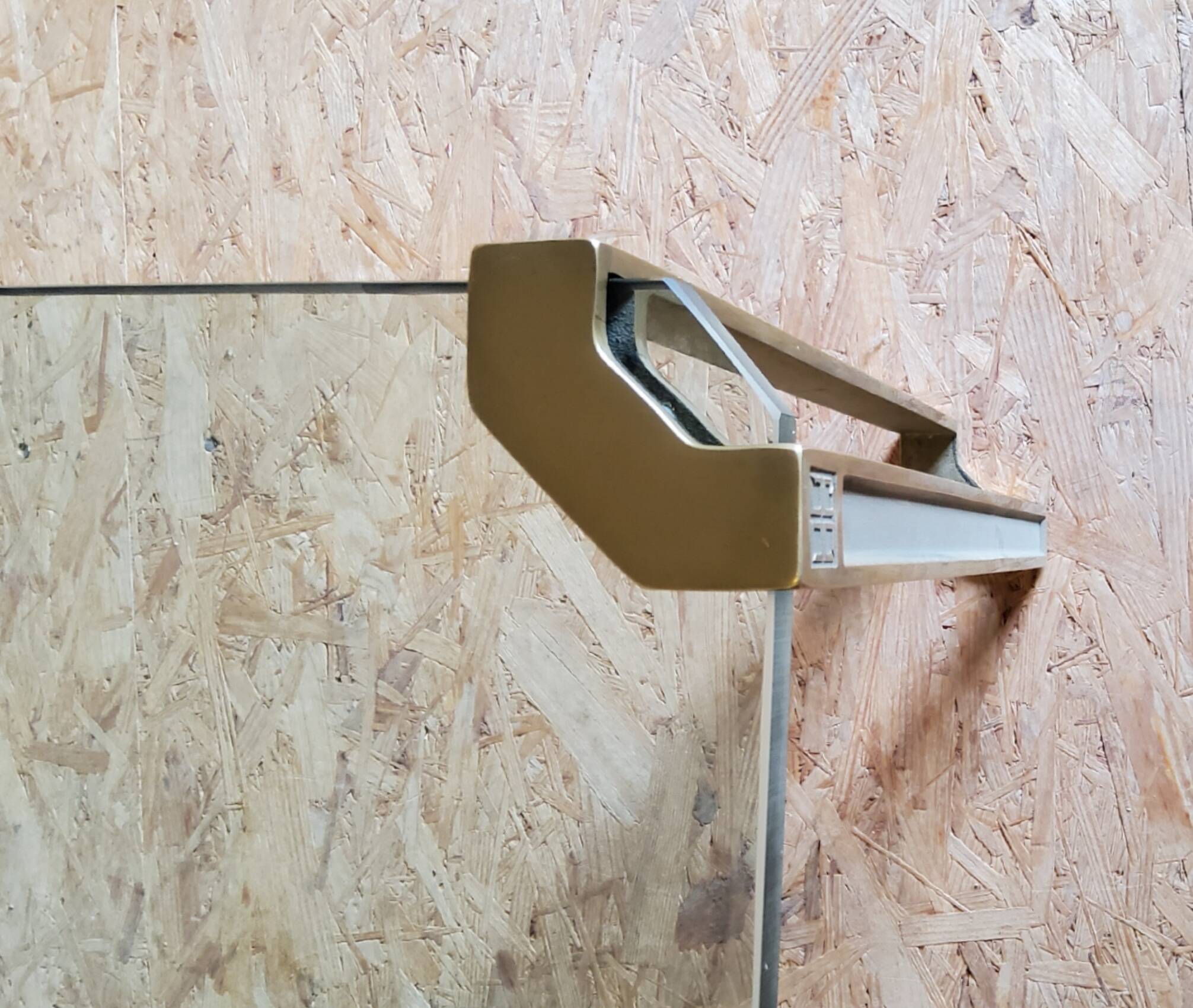 Glass and brass coffee tables by Peter Ghyczy