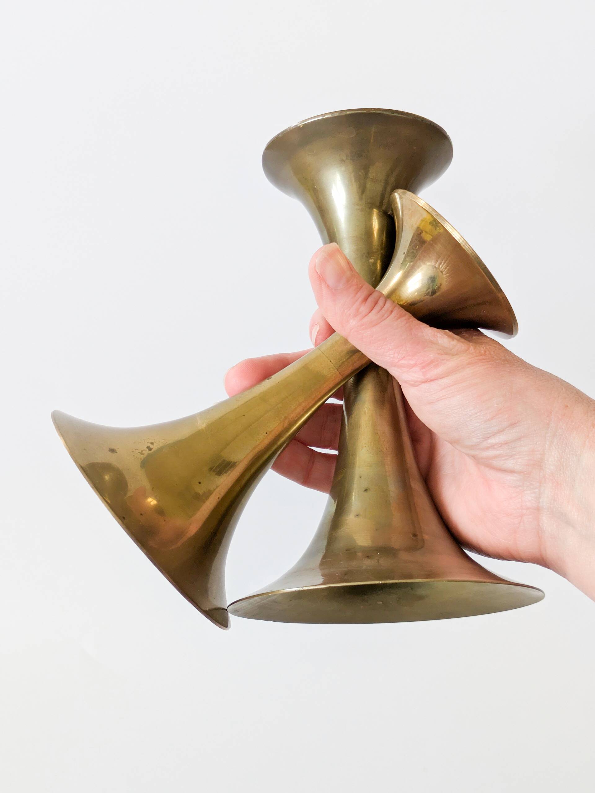 Pair of Midcentury brass candlesticks, flared shape.