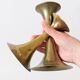 Pair of Midcentury brass candlesticks, flared shape.