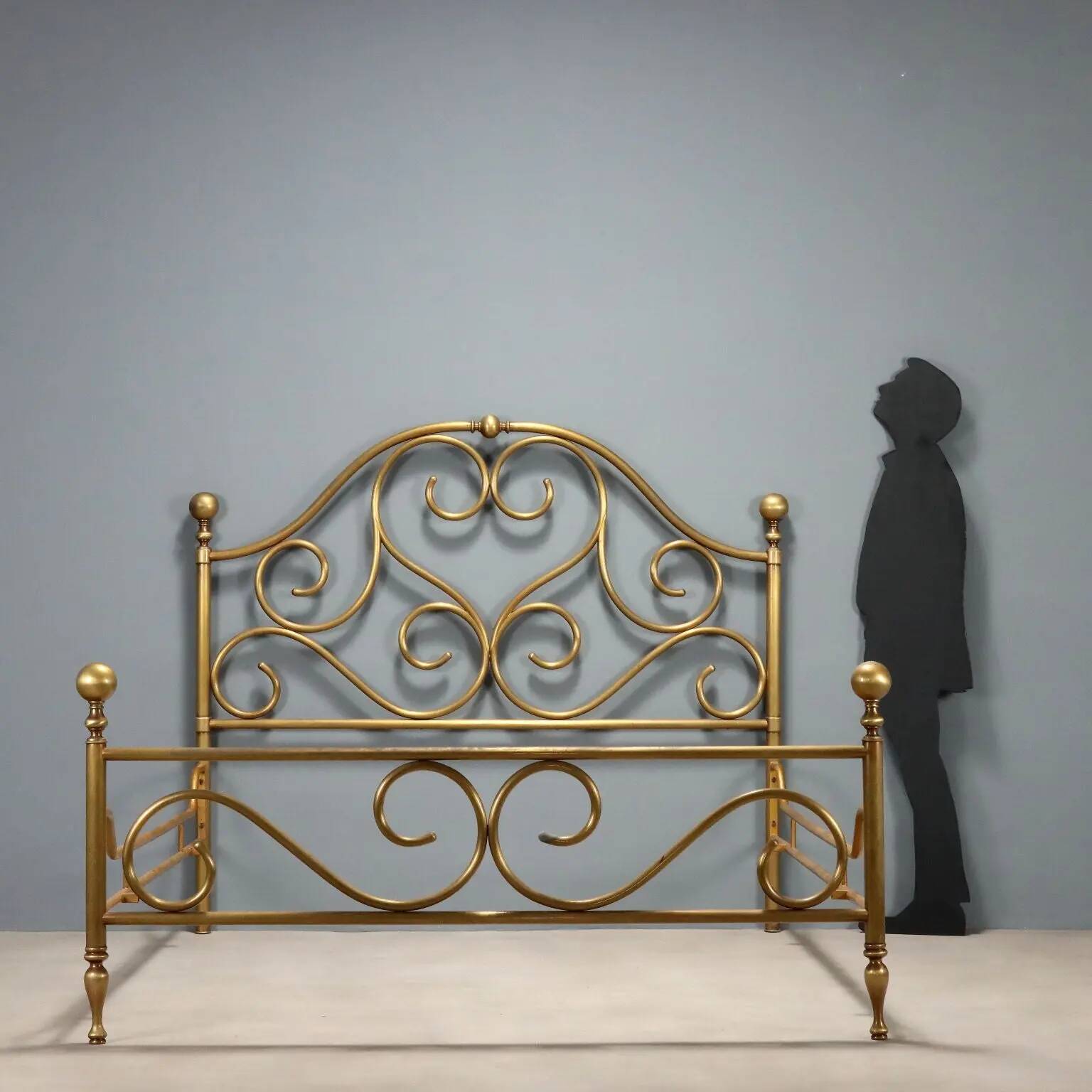 Antique double brass bed with decorations, Italy, 20th century.