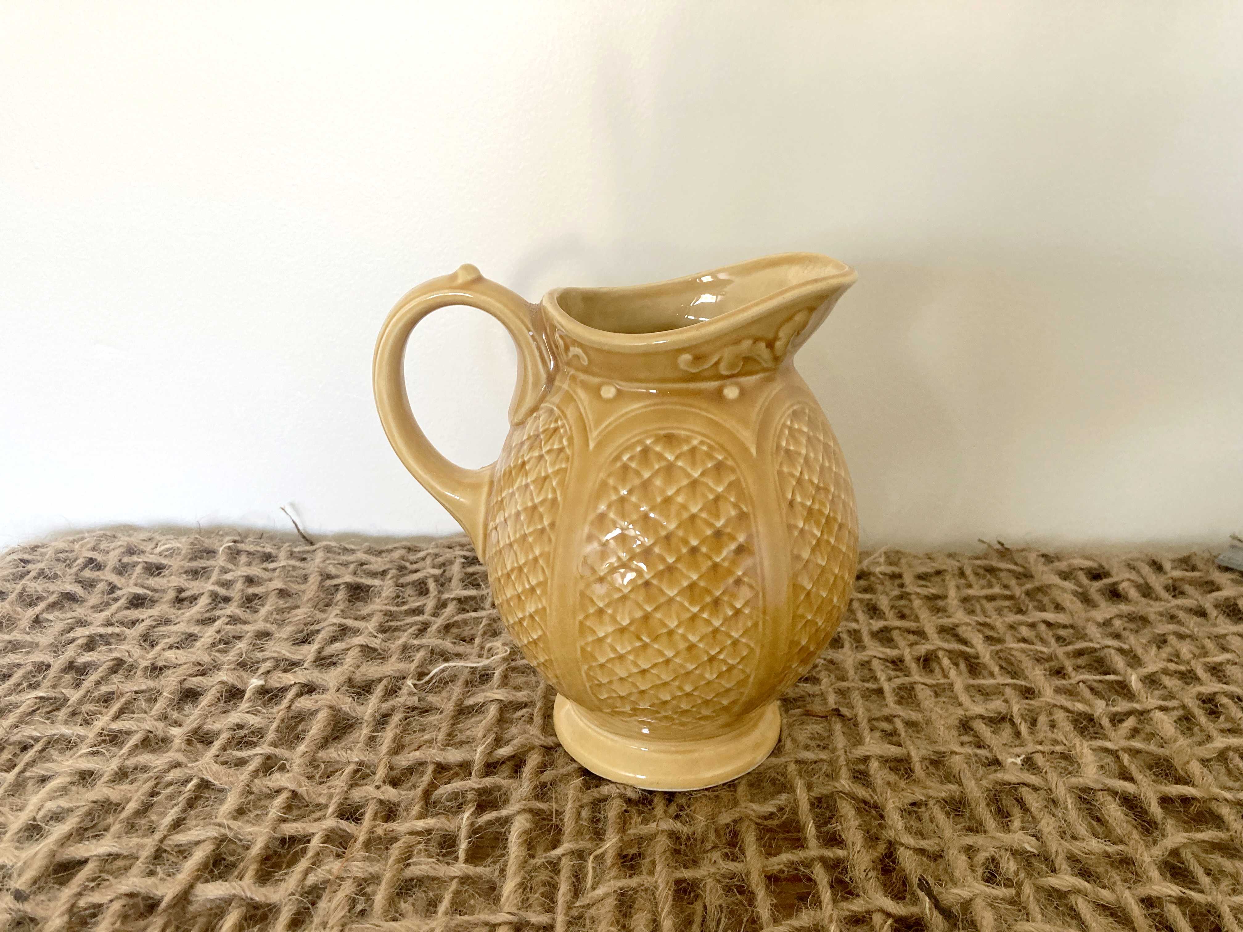 Mustard yellow ceralic pitcher