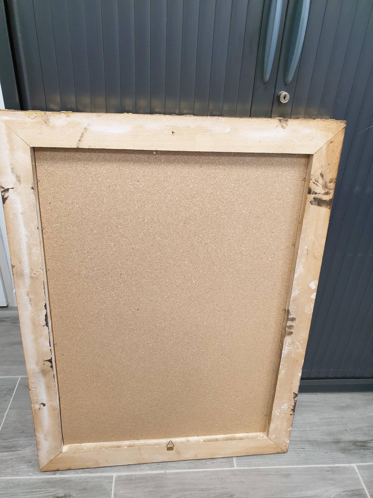 Beveled mirror and golden wood