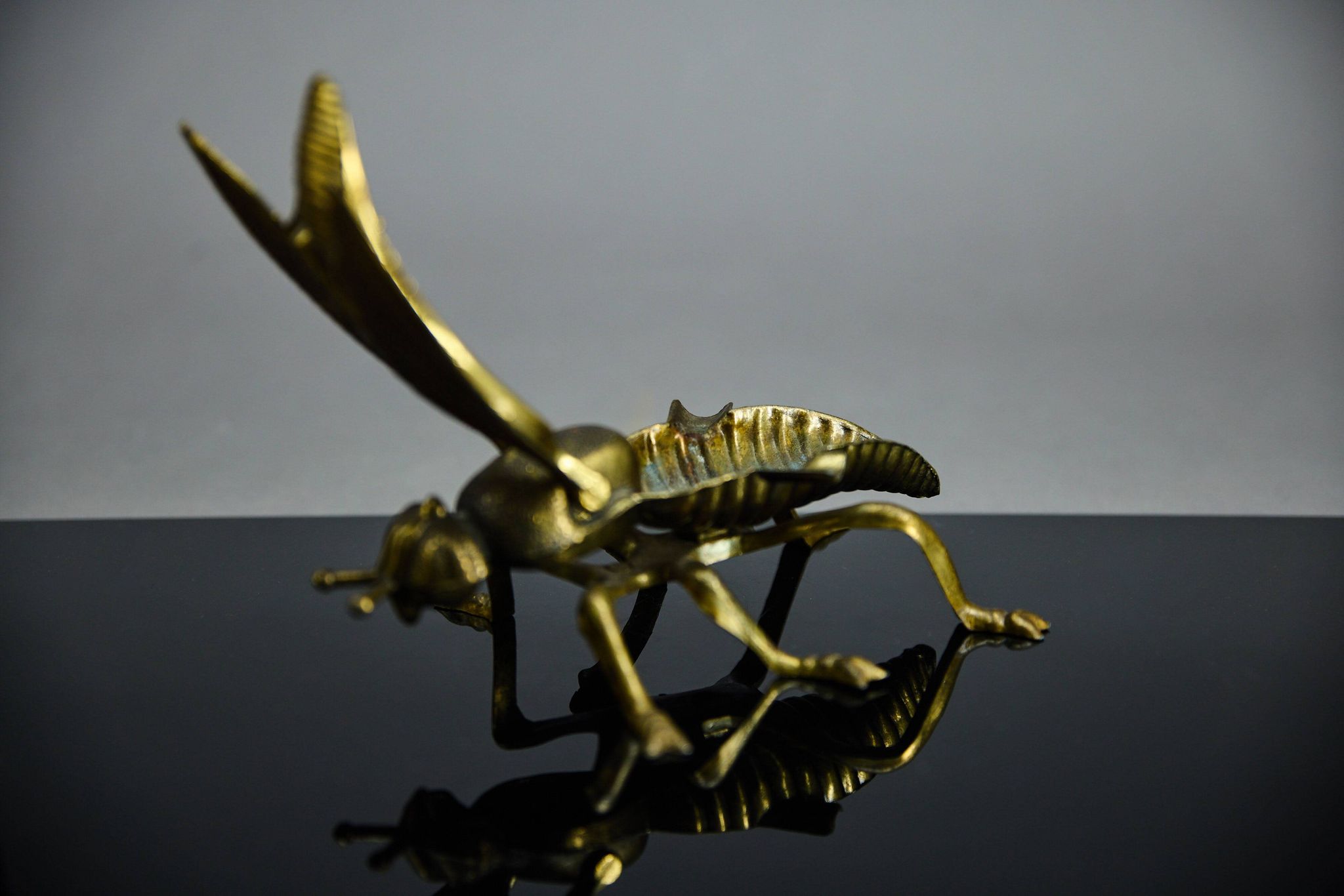Sculptural ashtray in the shape of a giant fly in brass, Italy, circa 1950.