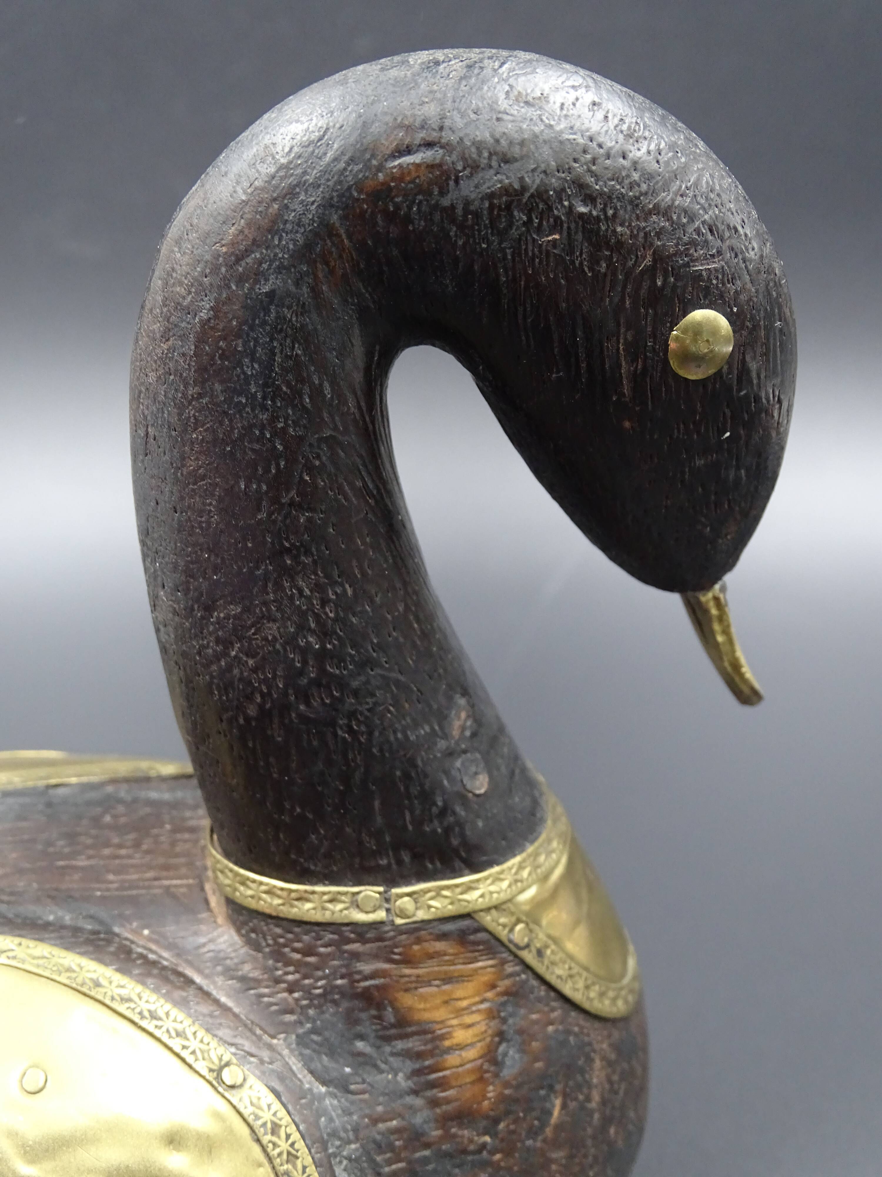 Wooden and brass swan