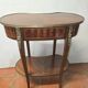 Kidney-shaped side table in Louis XVI style with marquetry.