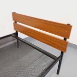 Vintage modernist style bed in metal and teak type formica from the 60s