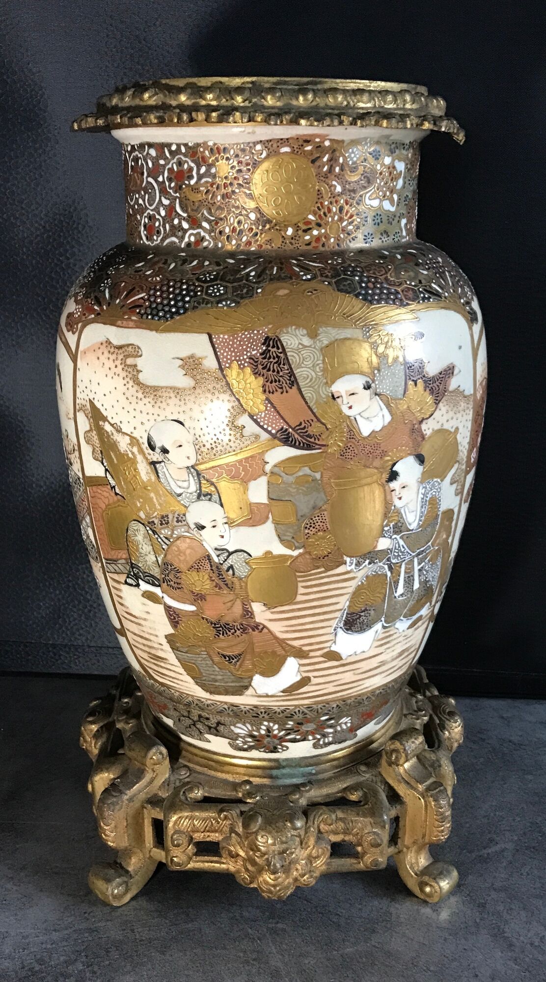 Old satsuma ceramic vase with various decorations mounted on bronze