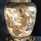 Old satsuma ceramic vase with various decorations mounted on bronze