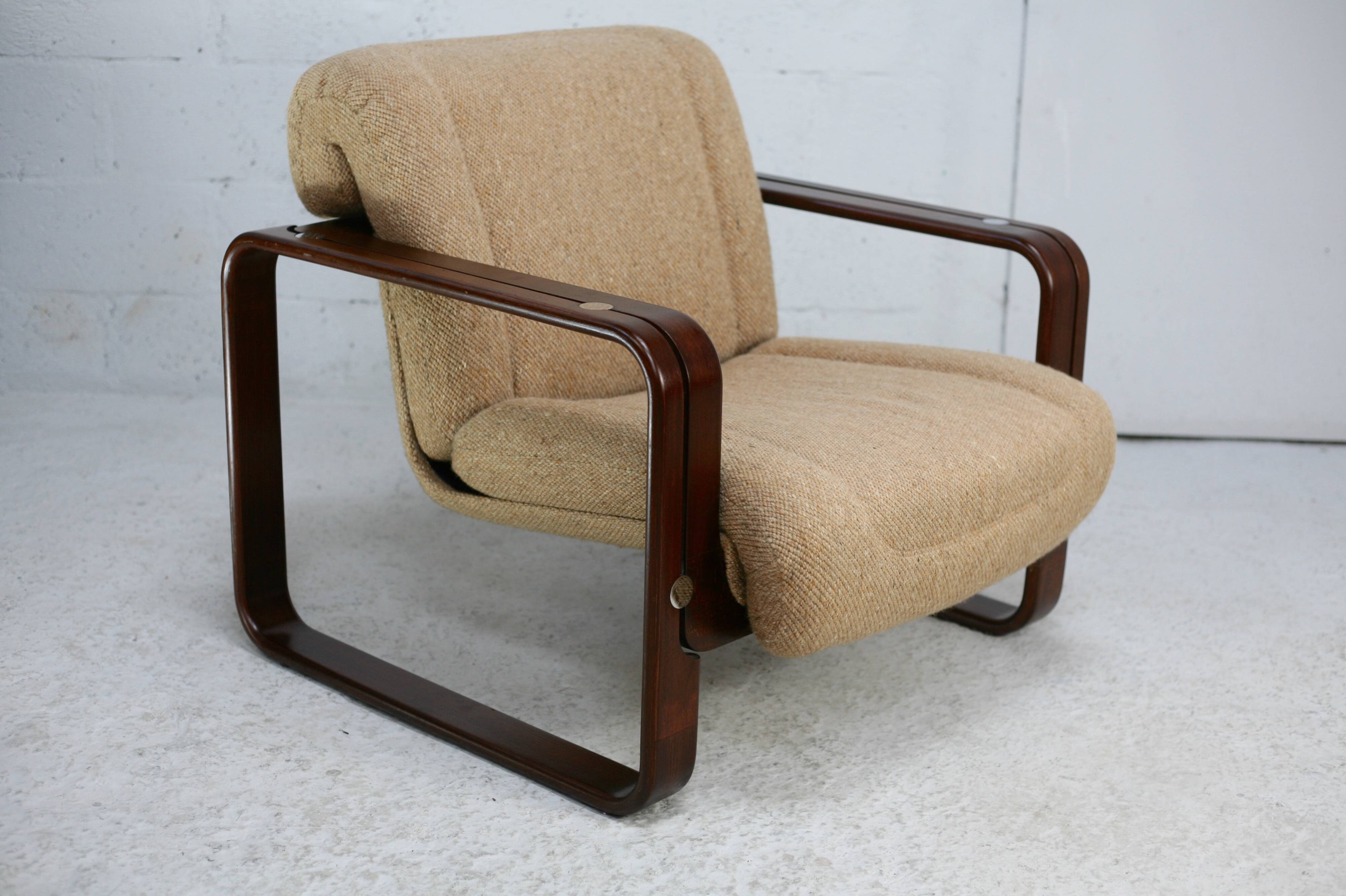 Modernist armchair. Wool, wood and steel. Circa 1970