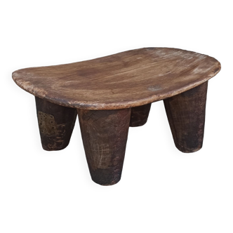 Antique wooden stool. Senufo African art from Côte d'Ivoire.