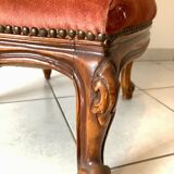 Petit fauteuil capitonné