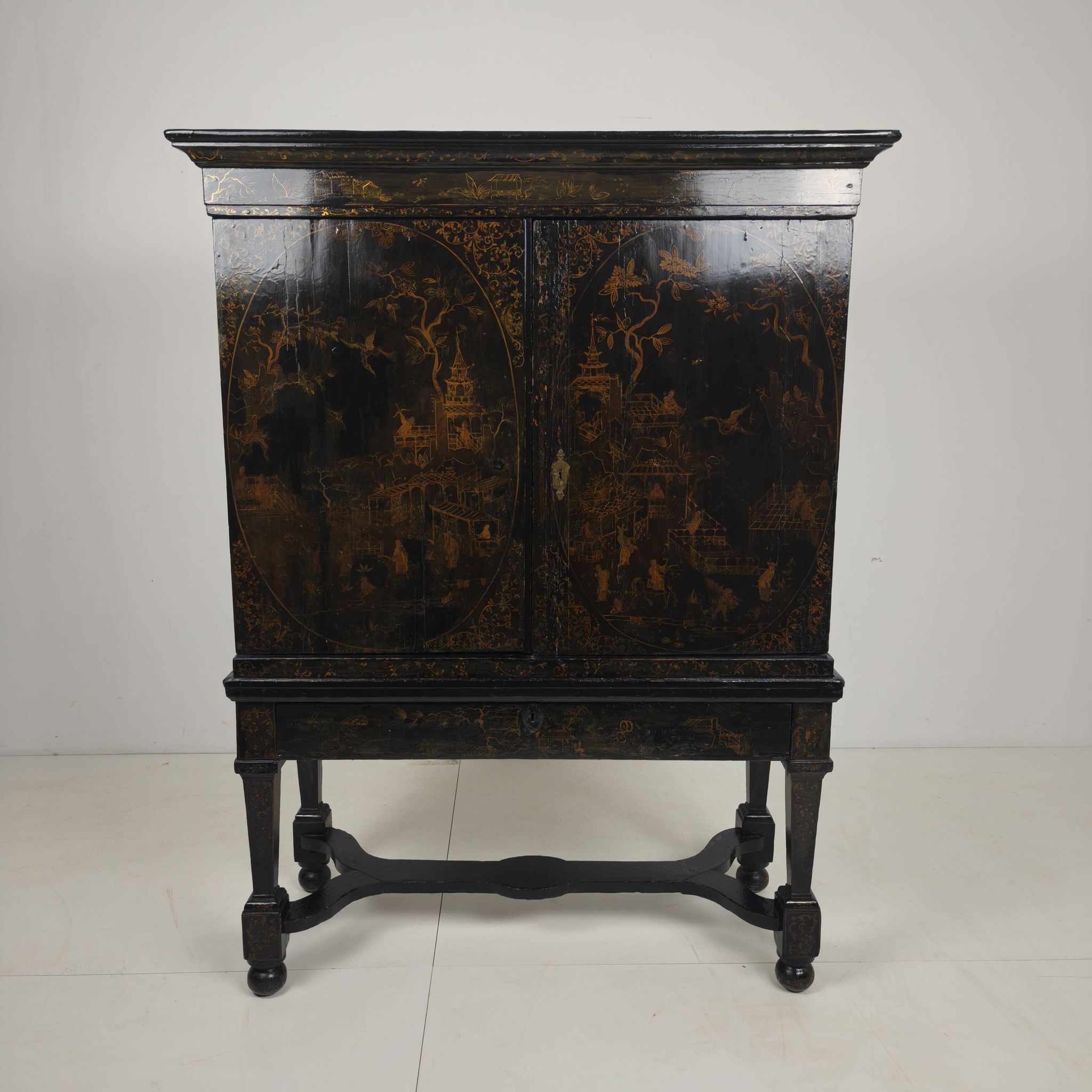 A rare early 18th-century Dutch japanned chinoiserie cabinet, circa 1700