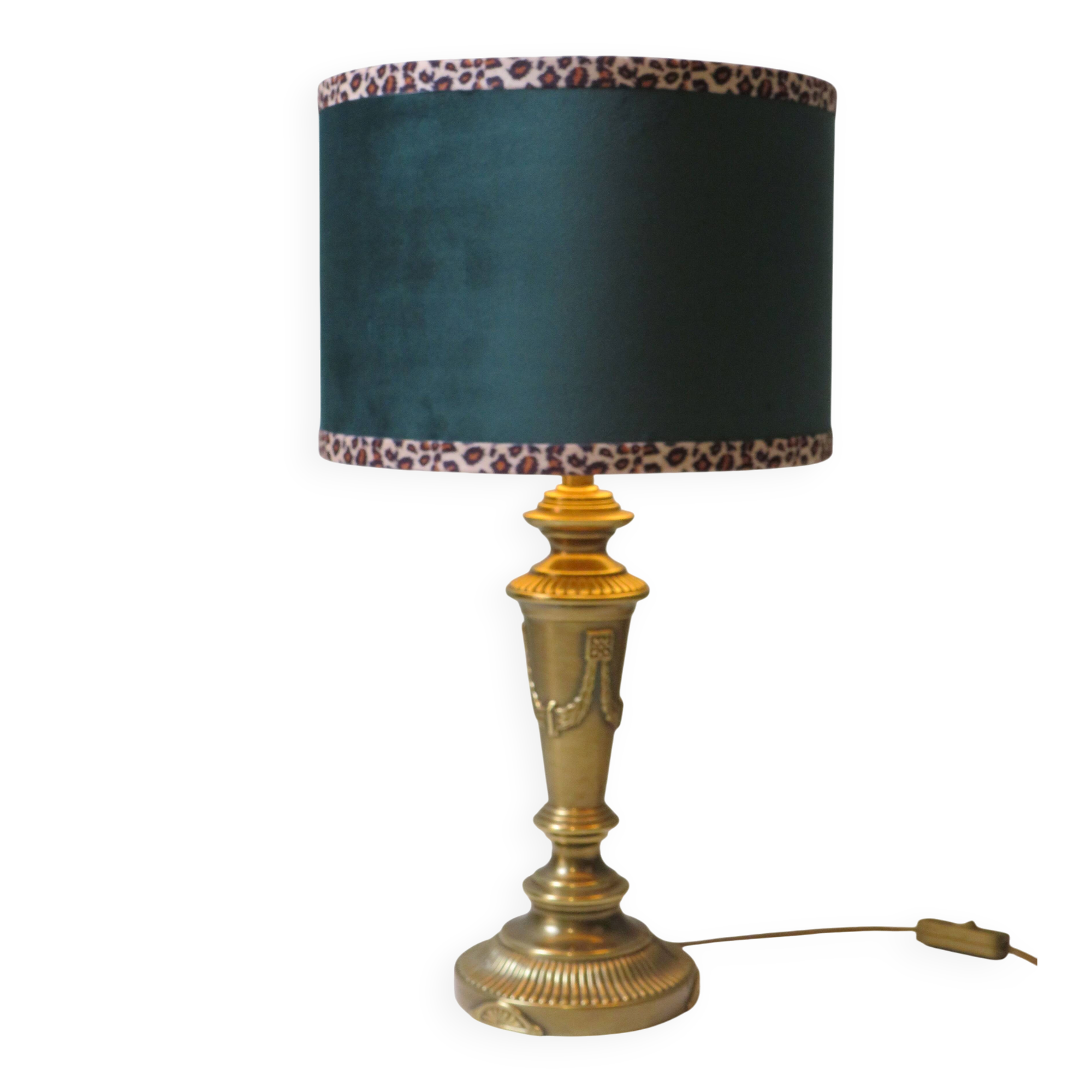 Vintage brass table lamp with green velvet shade.