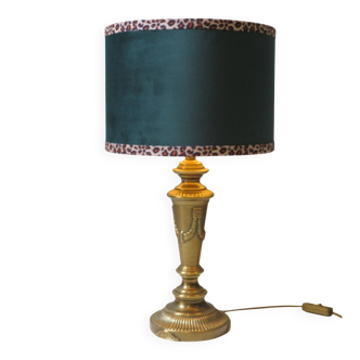 Vintage brass table lamp with green velvet shade.