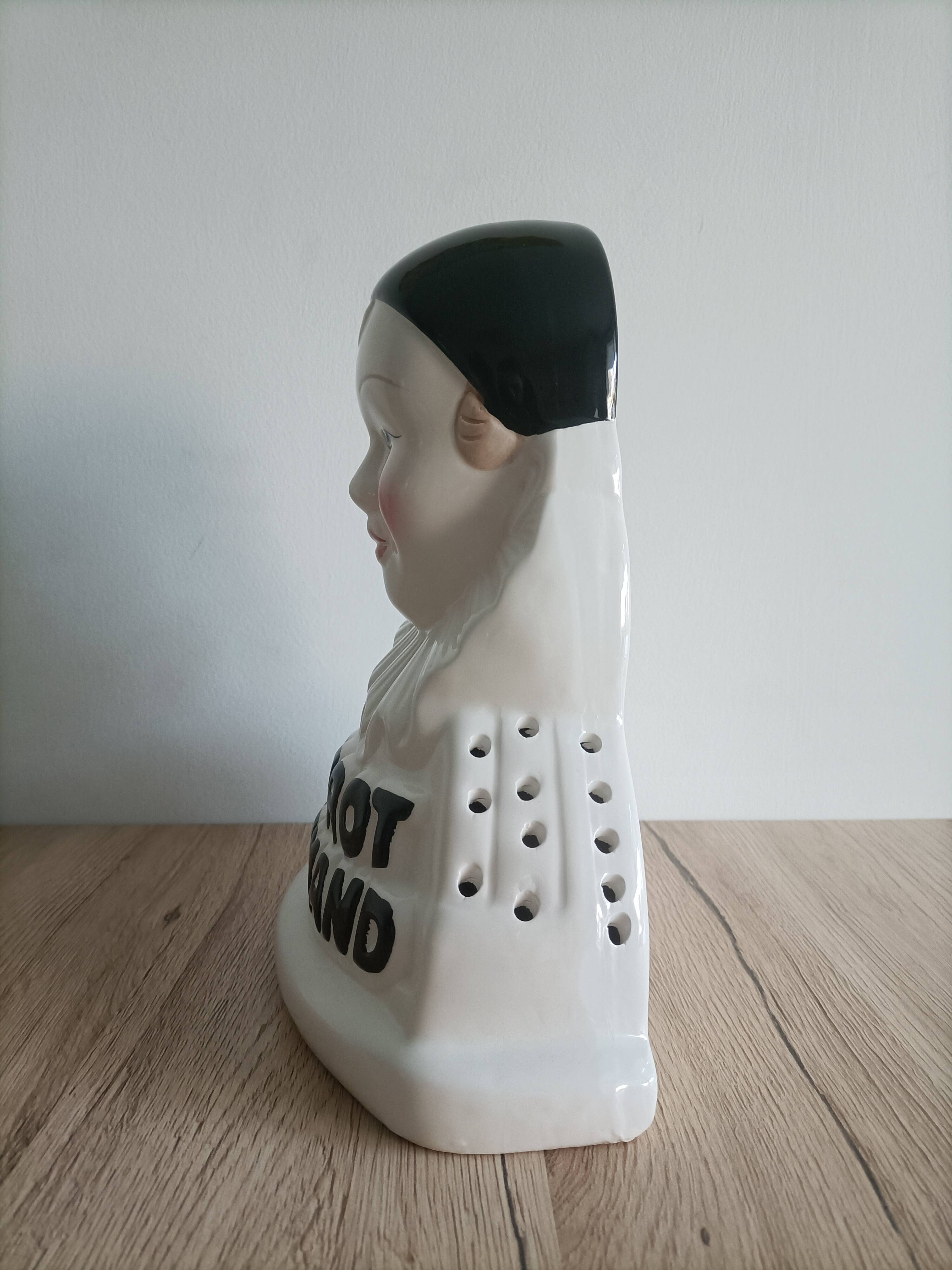 Pierrot gourmand advertising lollipop display in porcelain