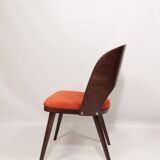 Scandinavian design orange papaya shell dining chairs