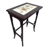 Nested tables in curved wood with ceramic top by Thonet.