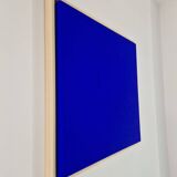 Framed monochrome blue abstract painting.